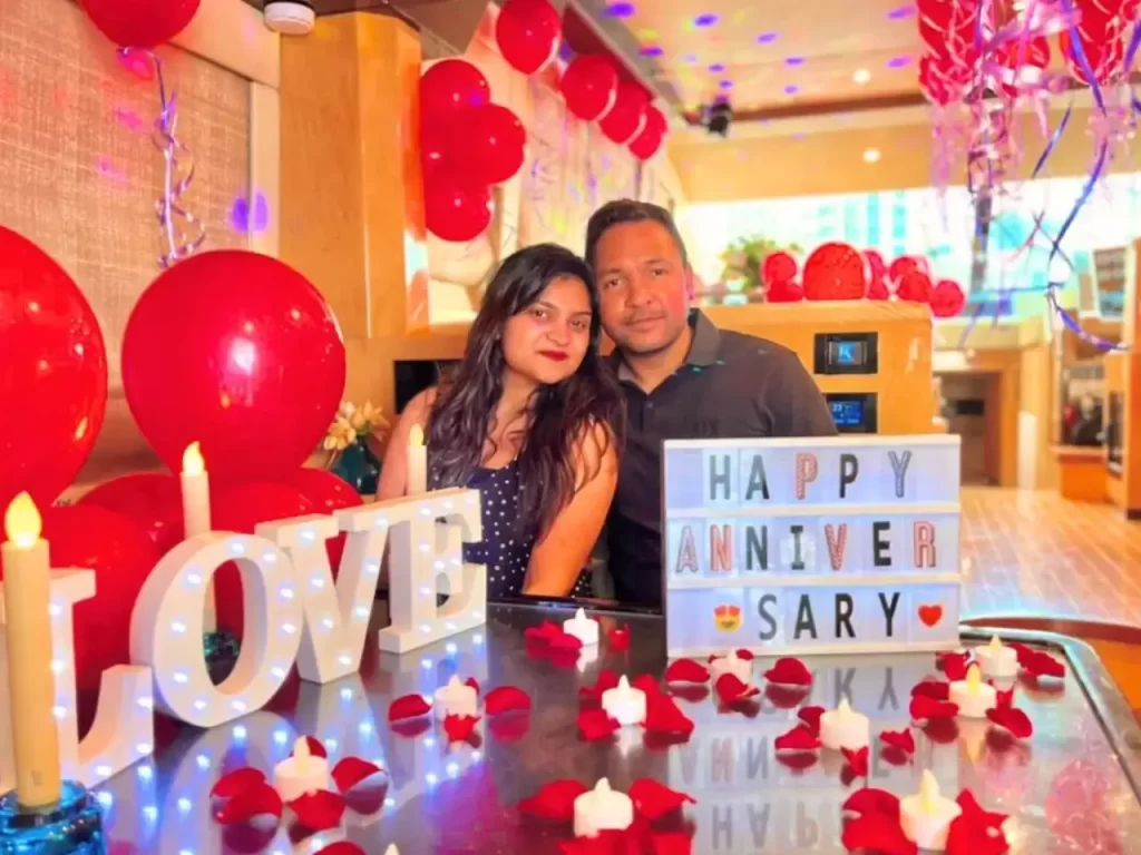 couple celebrating their anniversary in a yacht rental in dubai.